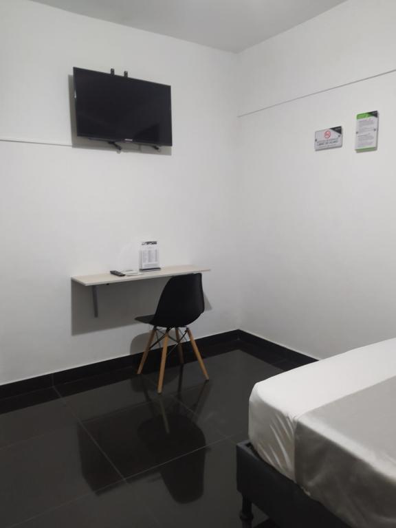 TV a/nebo společenská místnost v ubytování Hotel Aura Medellin