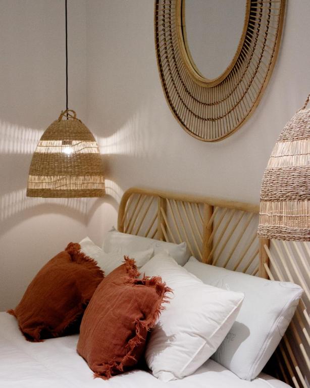 Postel nebo postele na pokoji v ubytování Casa du Soleil Hostal Boutique