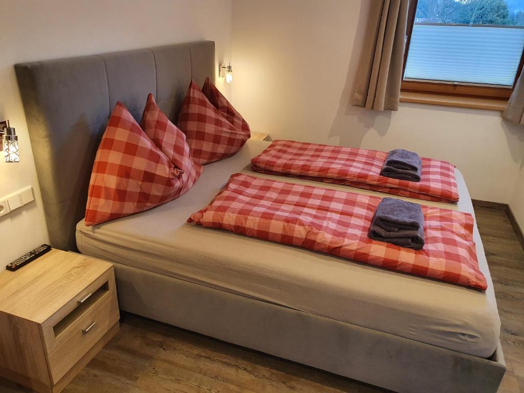 A bed or beds in a room at Haus Scheuerer