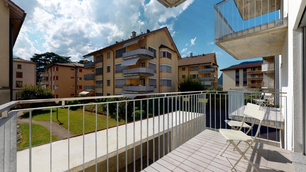 Uma varanda ou terraço em Nonanteneuf appart hōtel Aigle - contactless check-in