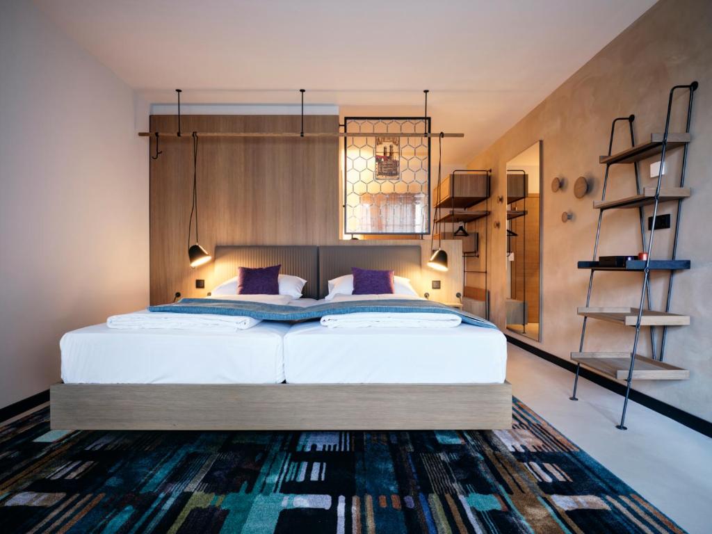 Postel nebo postele na pokoji v ubytování Hotel zur Post
