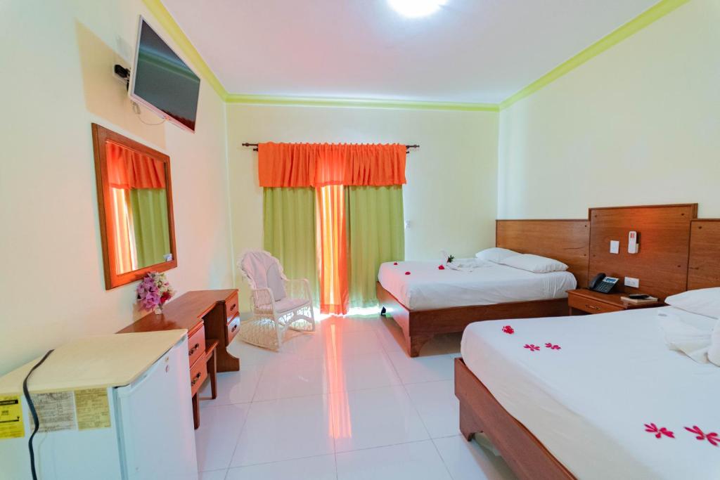 Postel nebo postele na pokoji v ubytování Hotel Yonu