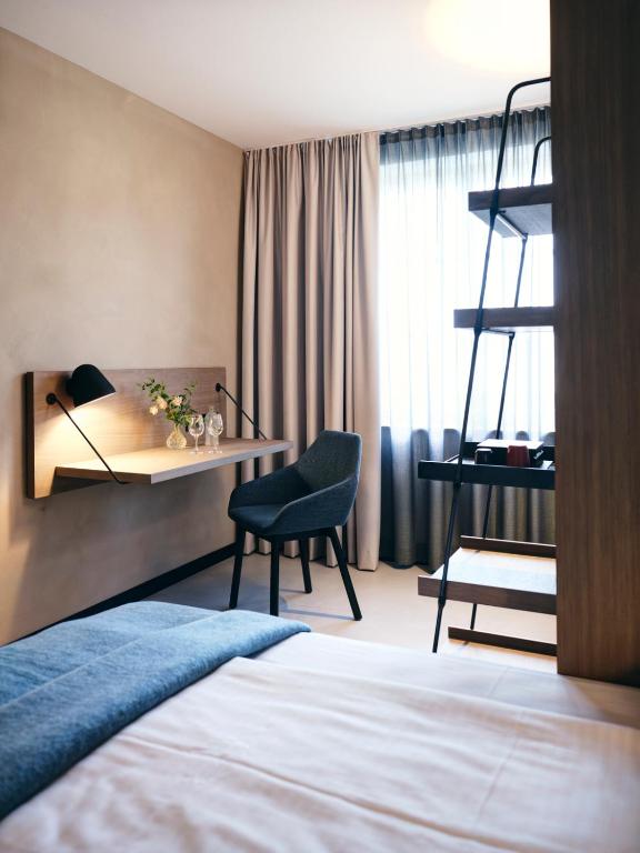 Postel nebo postele na pokoji v ubytování Hotel zur Post