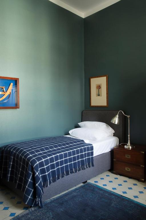 Postel nebo postele na pokoji v ubytování Hotel Art Nouveau am Kurfürstendamm