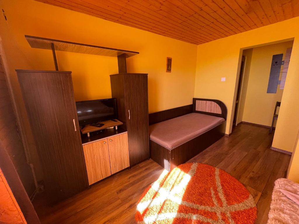 Postel nebo postele na pokoji v ubytování Cabana la Razvan
