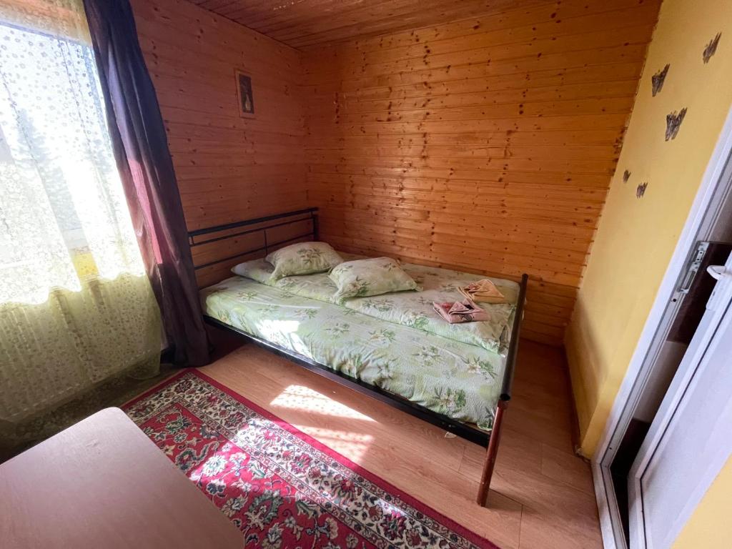 Postel nebo postele na pokoji v ubytování Cabana la Razvan