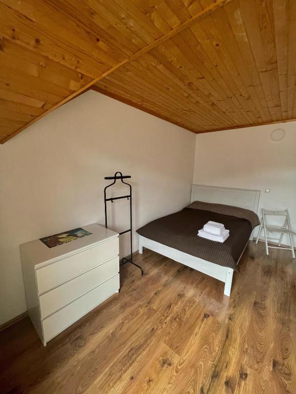 Postel nebo postele na pokoji v ubytování Yaremche House
