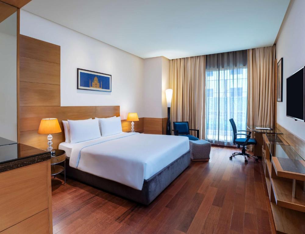 TV a/nebo společenská místnost v ubytování Radisson Blu Marina Hotel Connaught Place