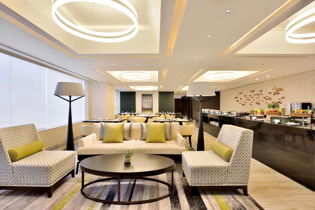 Posezení v ubytování Radisson Blu Faridabad