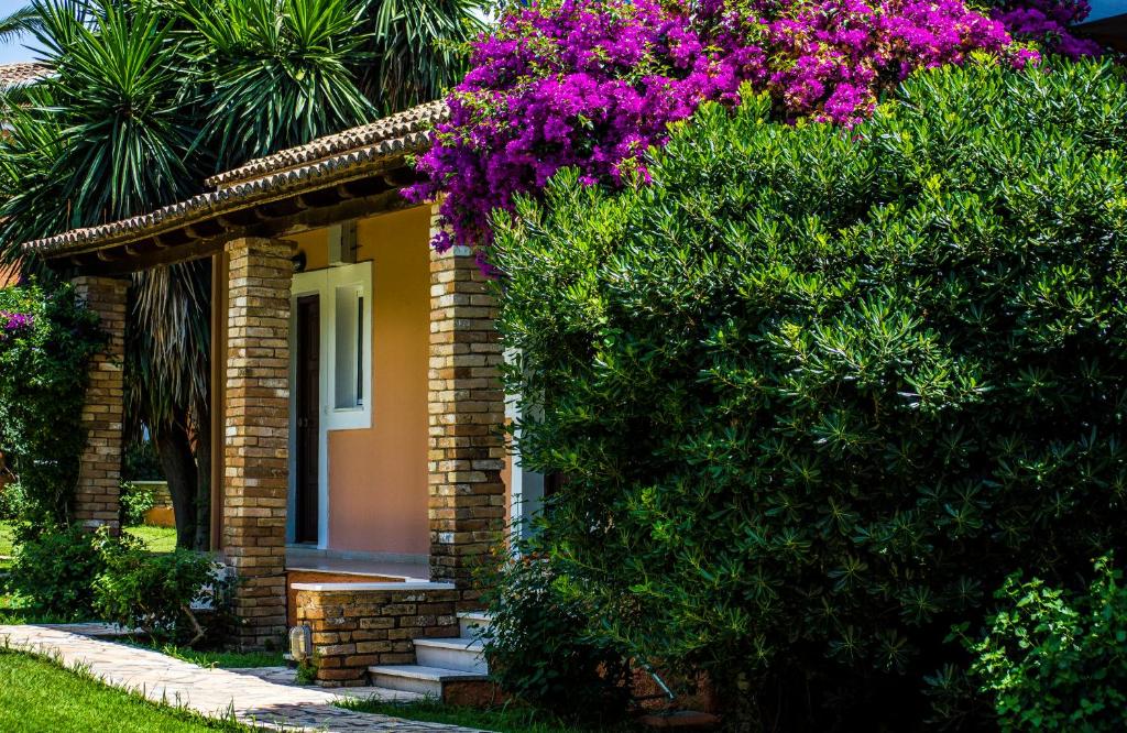 Vonkajšia záhrada v ubytovaní Folies Corfu Town Hotel Apartments