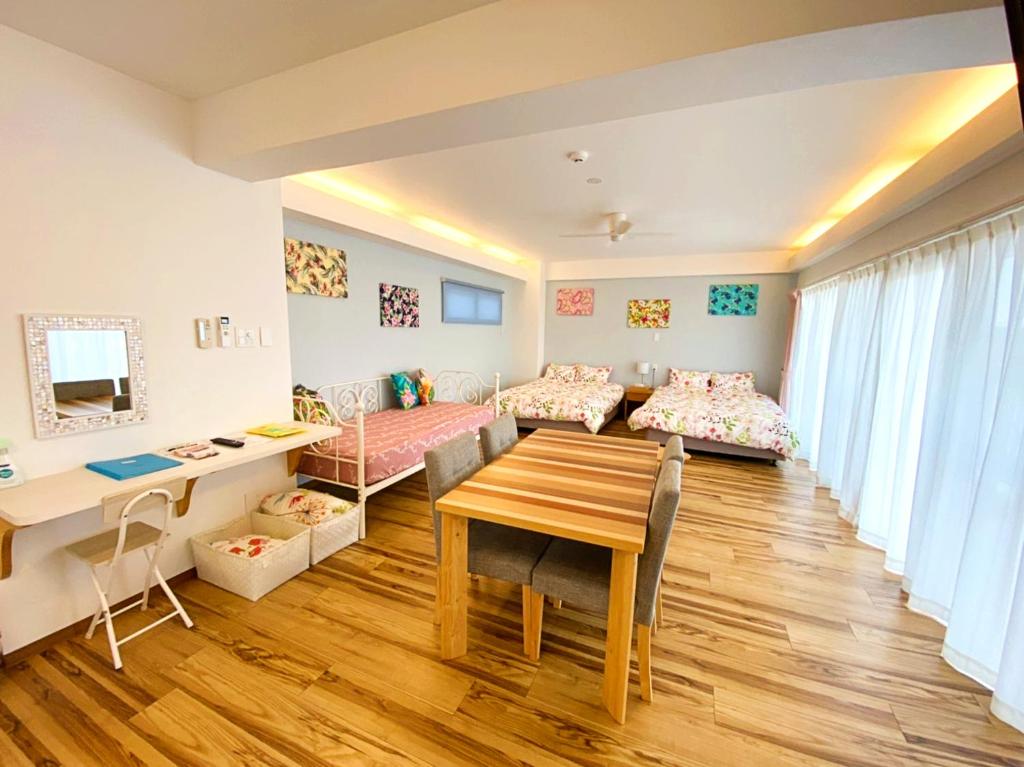 Postel nebo postele na pokoji v ubytování HOTEL HOUKLEA
