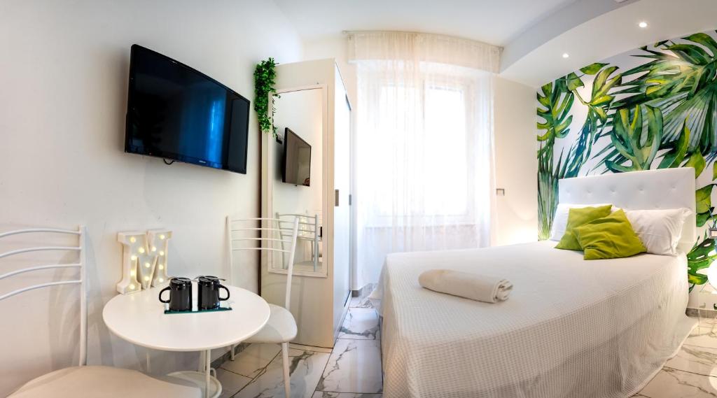 Postel nebo postele na pokoji v ubytování ORA BLU Guest house