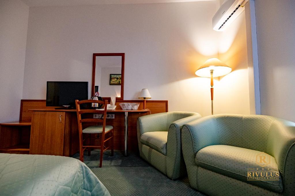 TV a/nebo společenská místnost v ubytování Hotel Rivulus