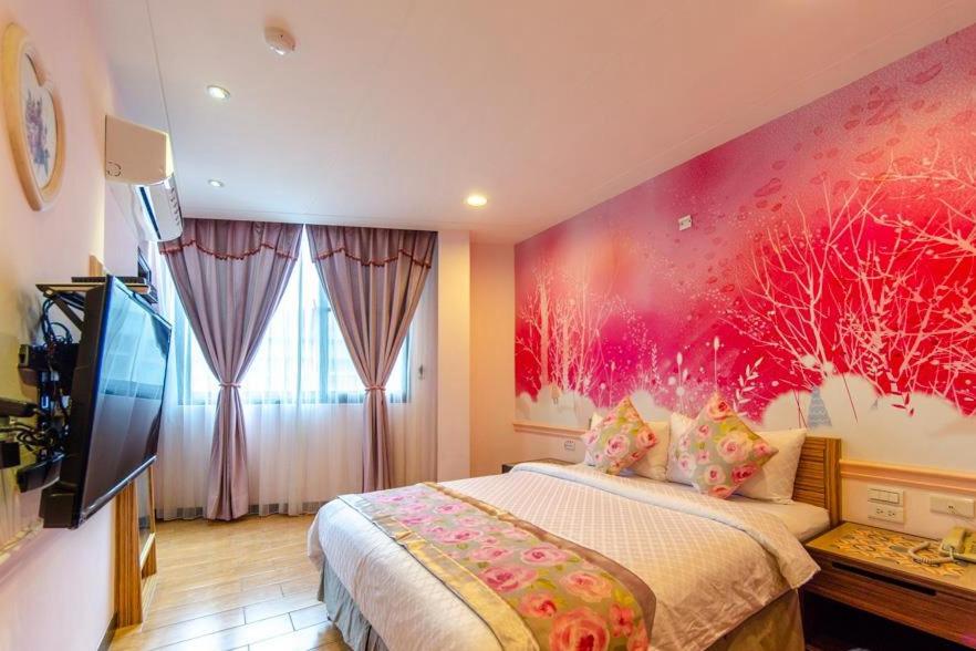 Postel nebo postele na pokoji v ubytování Chamie B&B