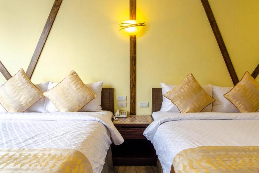 Postel nebo postele na pokoji v ubytování Chamie B&B