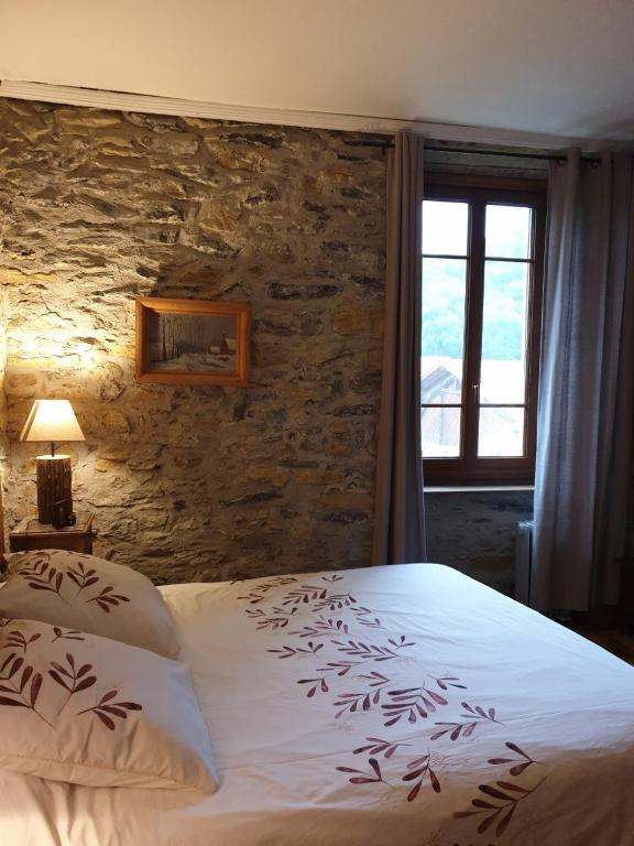 Postel nebo postele na pokoji v ubytování chambre et table d'hôtes La Grande Ourse