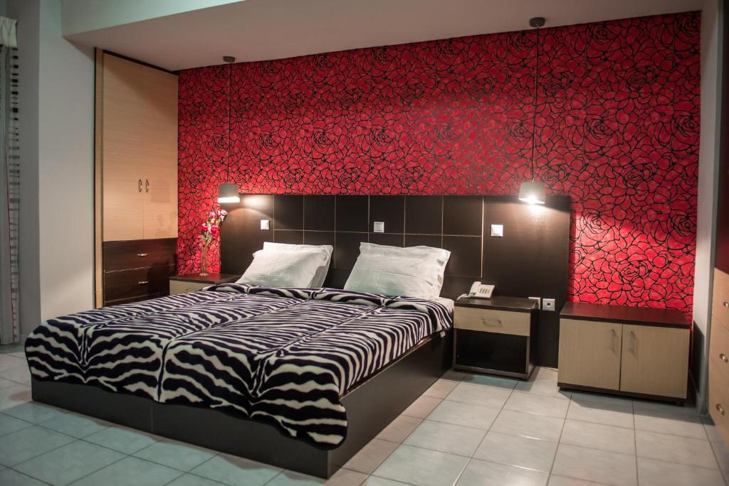 Postel nebo postele na pokoji v ubytování sozos inn hotel vonitsa