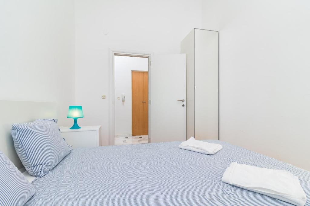 Postelja oz. postelje v sobi nastanitve SEA VIEW APARTMENT