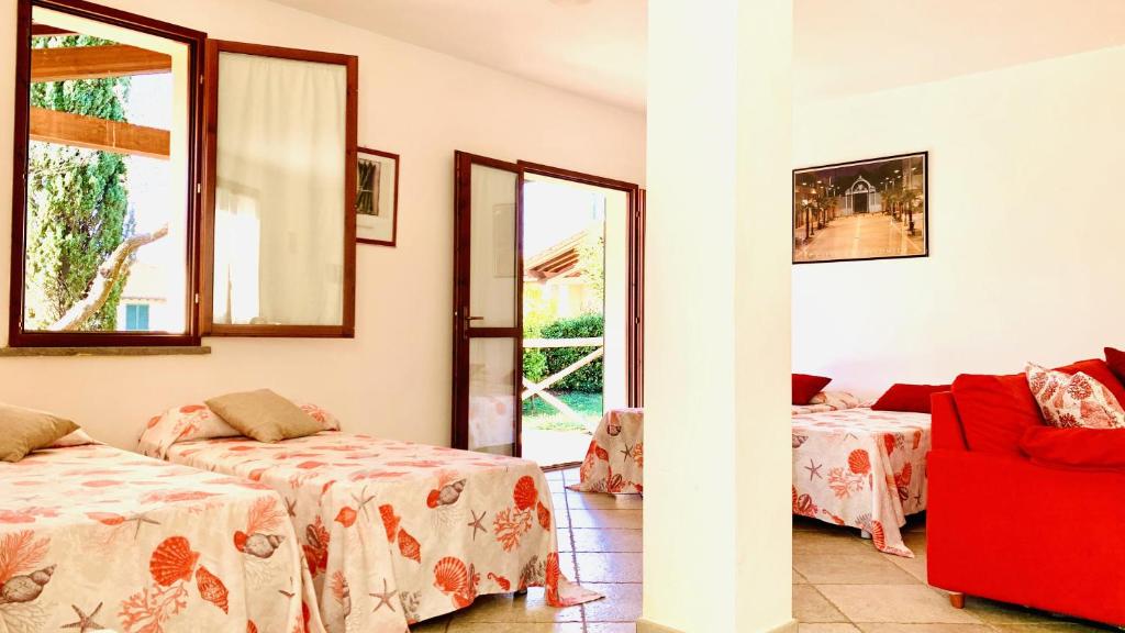Postel nebo postele na pokoji v ubytování Casa in Maremma Tuscany Village