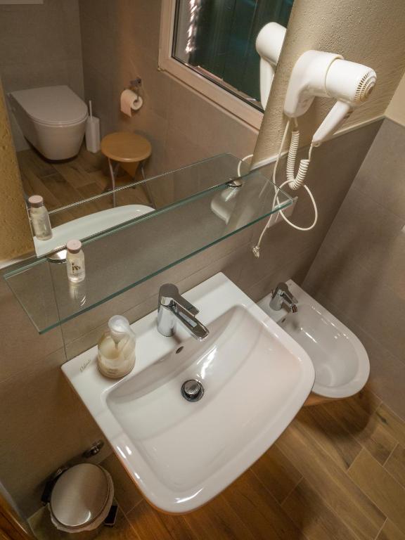 Koupelna v ubytování Rafting Hotel Ai Cavallini