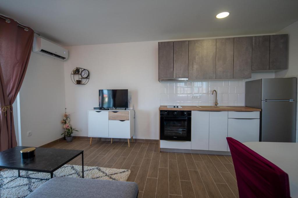 Kuchyňa alebo kuchynka v ubytovaní Apartman Antea 2