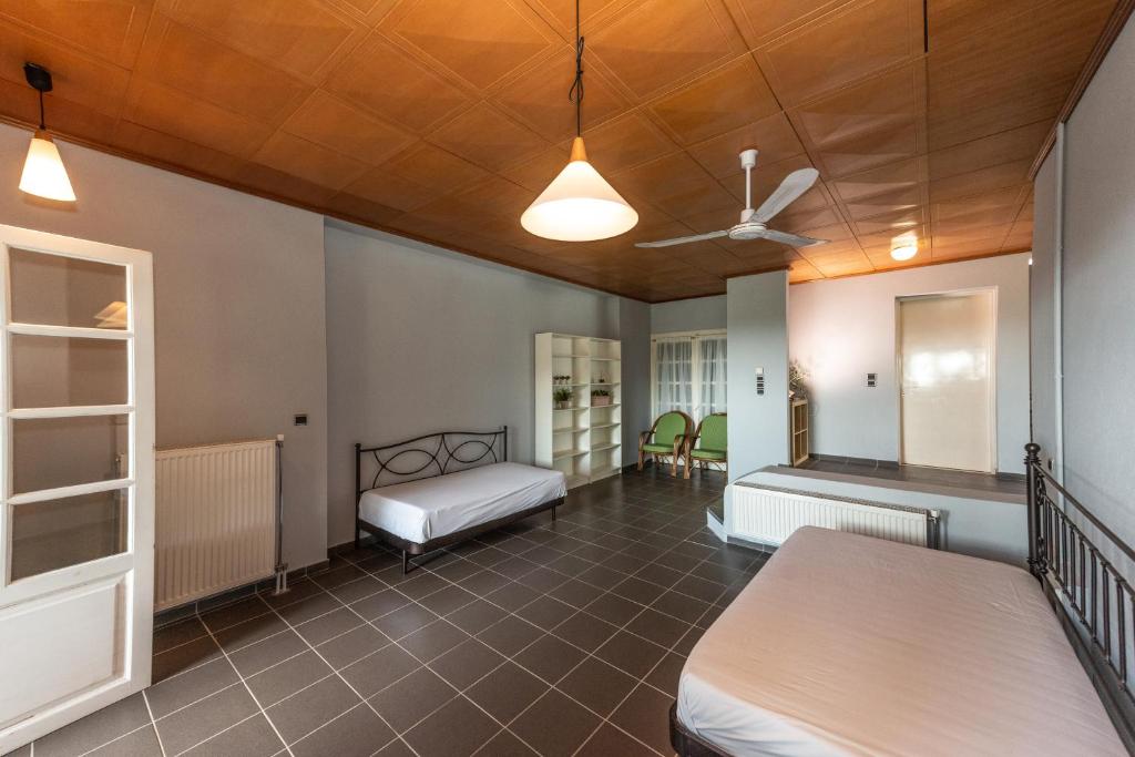 A bed or beds in a room at Lns Vip Villas