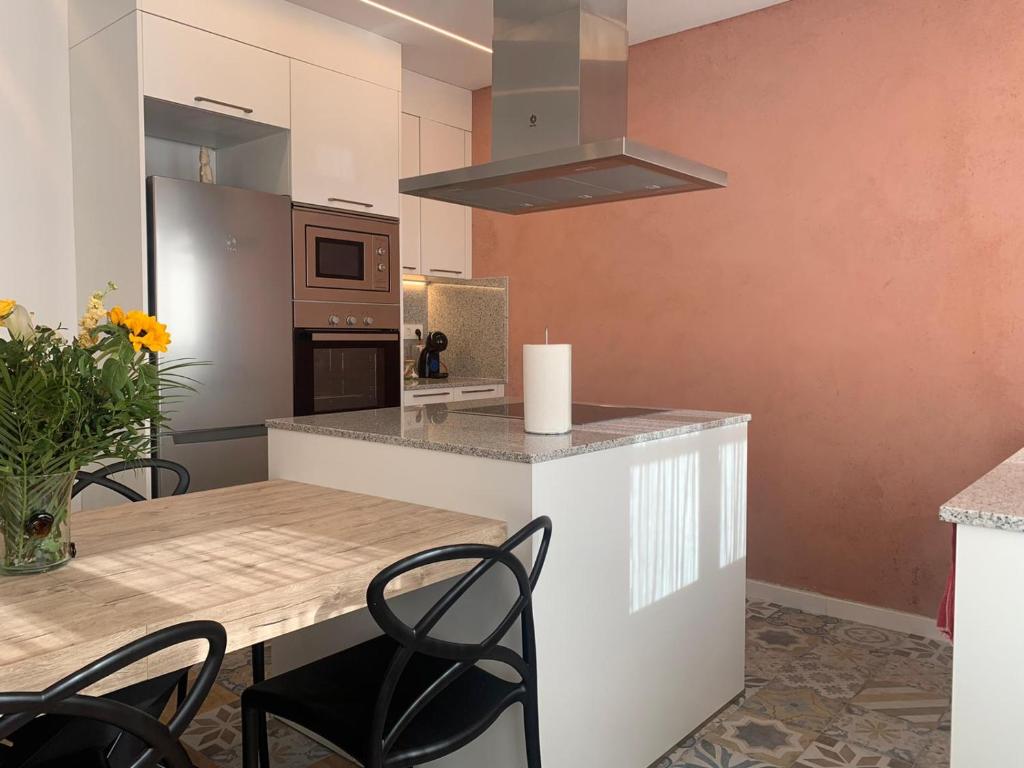 A kitchen or kitchenette at Ca La Fustereta