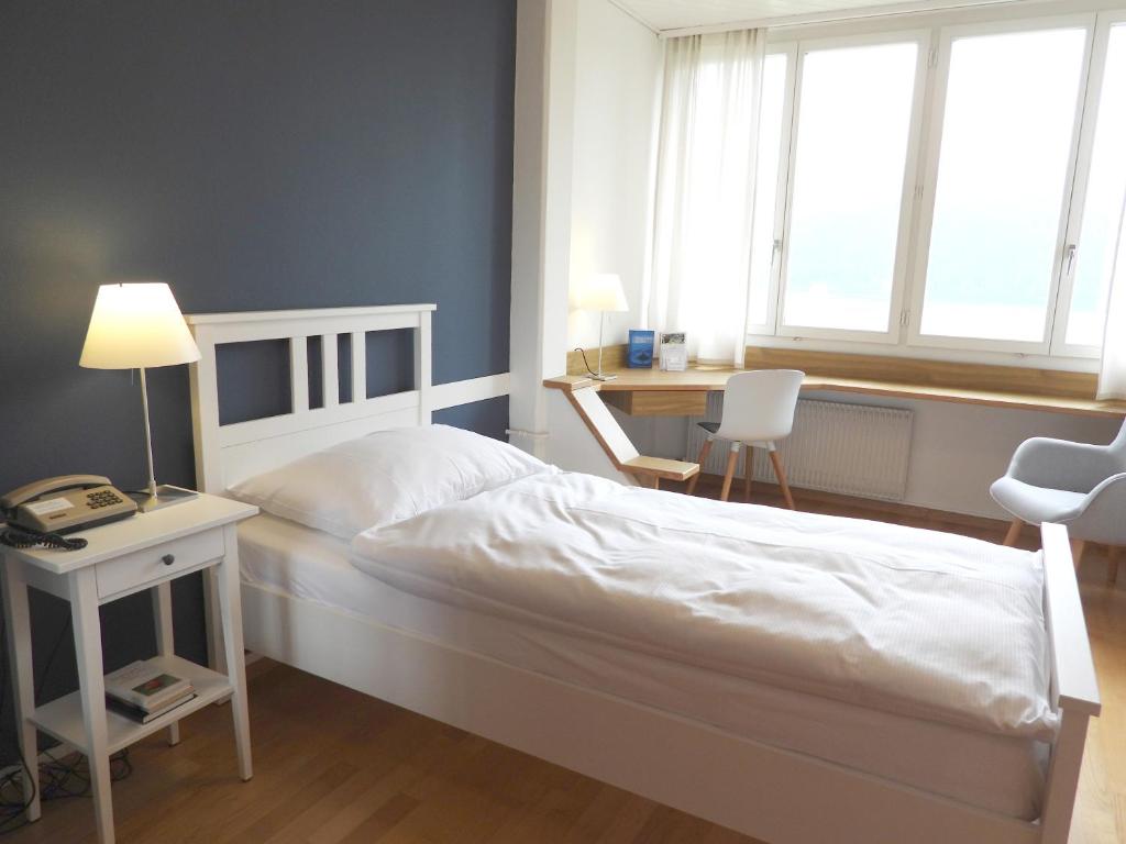 Postel nebo postele na pokoji v ubytování Hotel Ländli