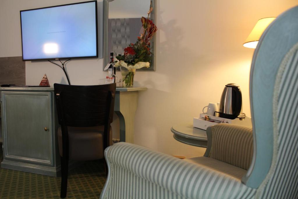 TV a/nebo společenská místnost v ubytování Hotel Residenz Bad Frankenhausen