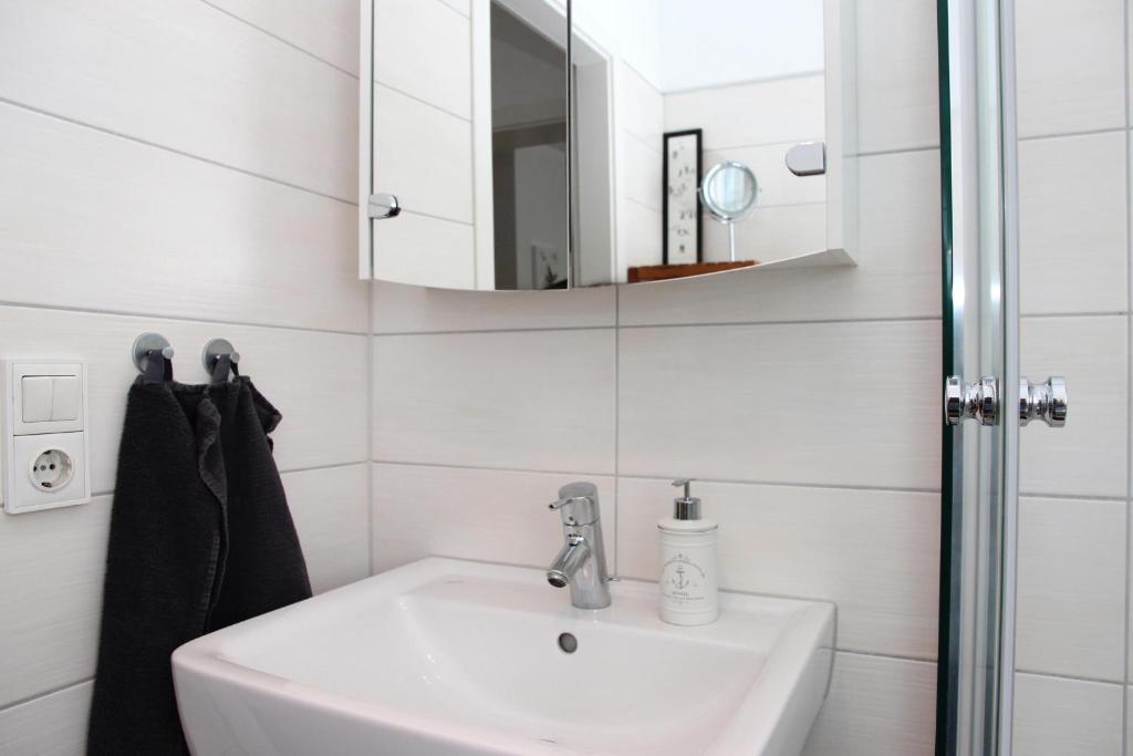 Koupelna v ubytování Ferienwohnung Seeloft mit Balkon und Seeblick