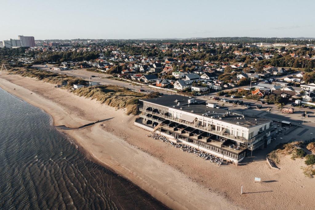 an aerial view of a beach with a building at Ocean Hotel in Falkenberg