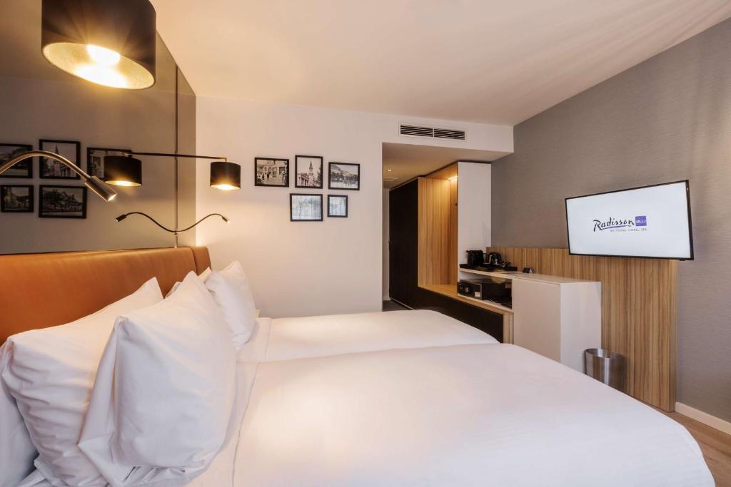 Postel nebo postele na pokoji v ubytování Radisson BLU Balmoral