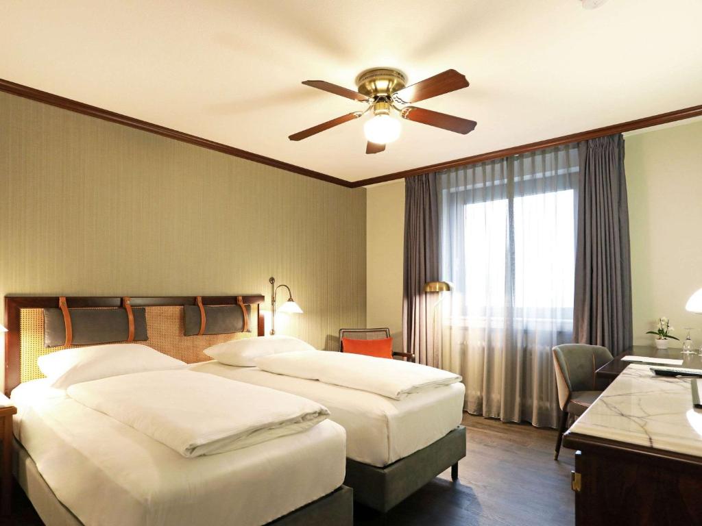 Postel nebo postele na pokoji v ubytování Mercure Hotel Frankfurt Airport Langen