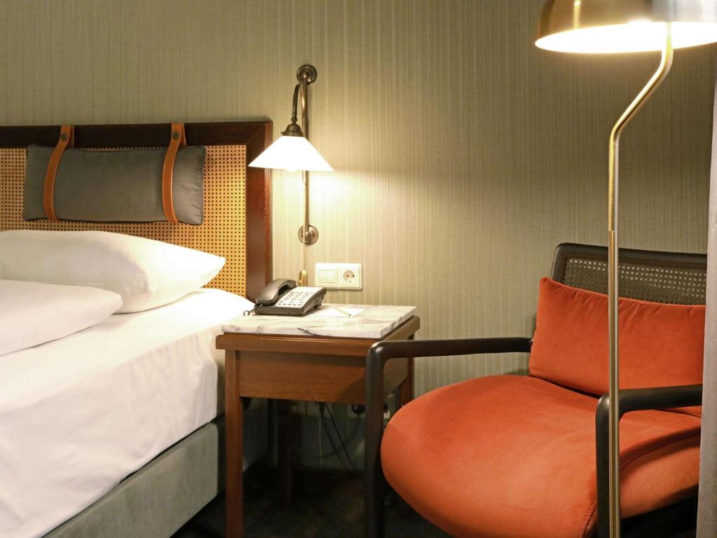 Postel nebo postele na pokoji v ubytování Mercure Hotel Frankfurt Airport Langen