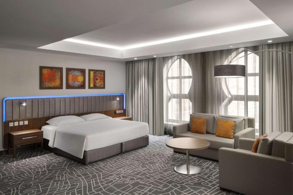 Postel nebo postele na pokoji v ubytování Park Inn by Radisson Makkah Aziziyah