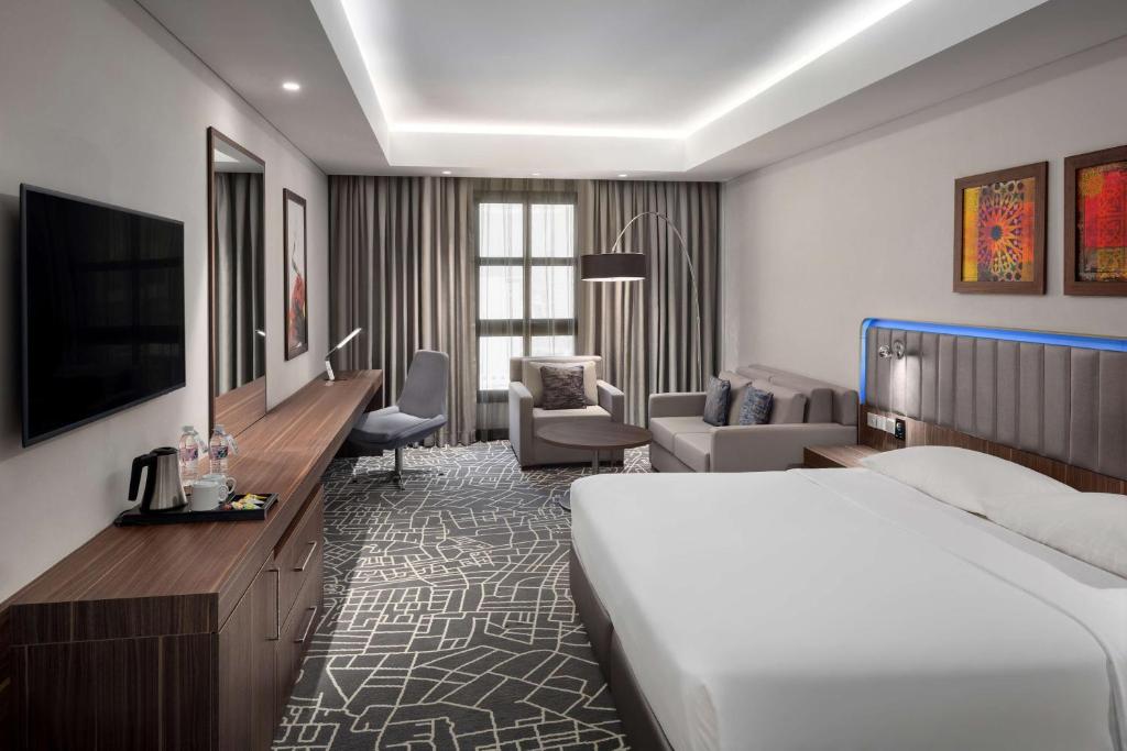 Postel nebo postele na pokoji v ubytování Park Inn by Radisson Makkah Aziziyah