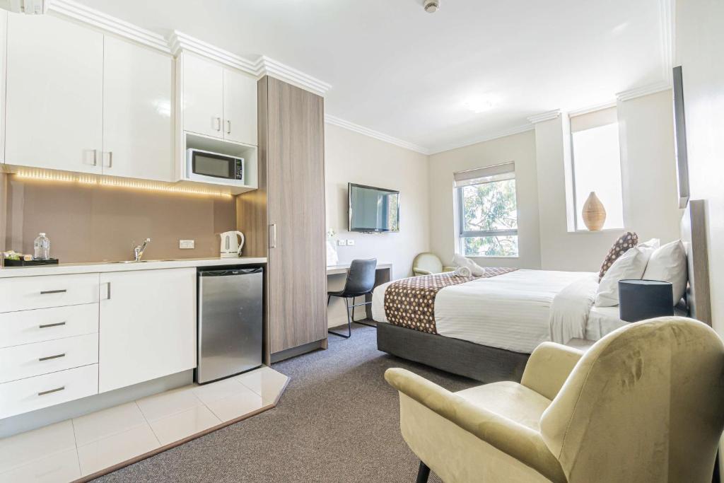Kuchyň nebo kuchyňský kout v ubytování Best Western Plus Camperdown Suites