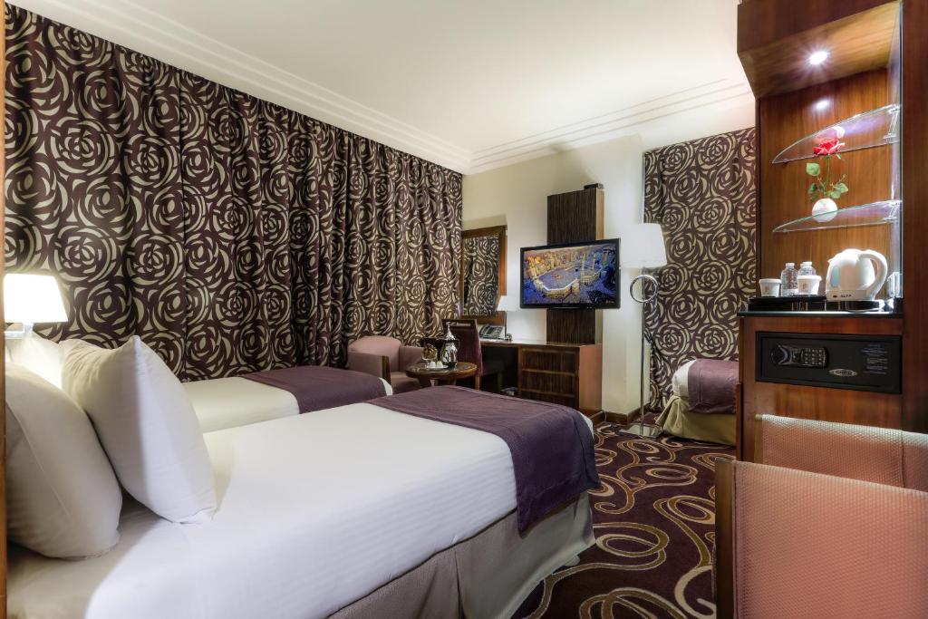 TV a/nebo společenská místnost v ubytování Elaf Kinda Hotel