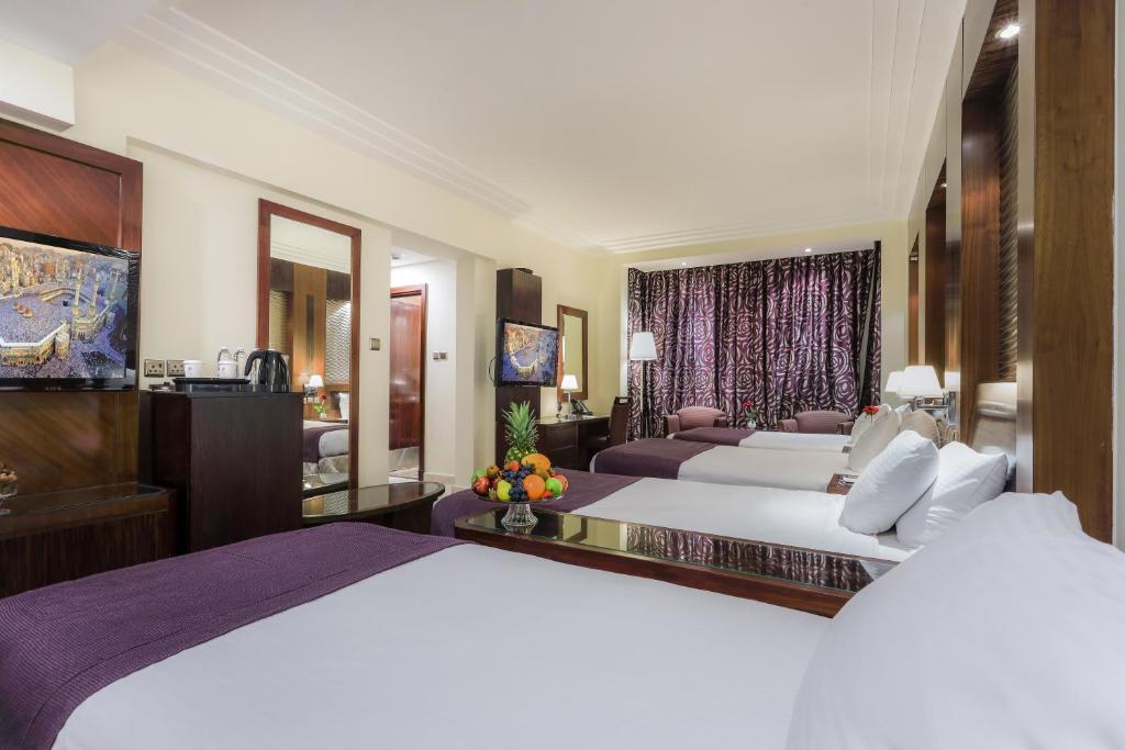Postel nebo postele na pokoji v ubytování Elaf Kinda Hotel