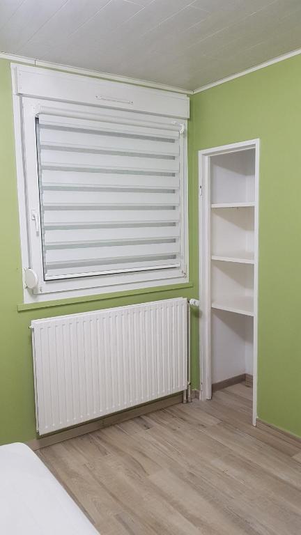 Postel nebo postele na pokoji v ubytování Gîte des Vosges du Sud