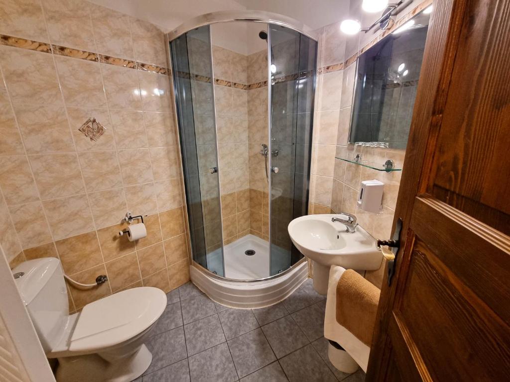 Koupelna v ubytování Penzion Rotunda