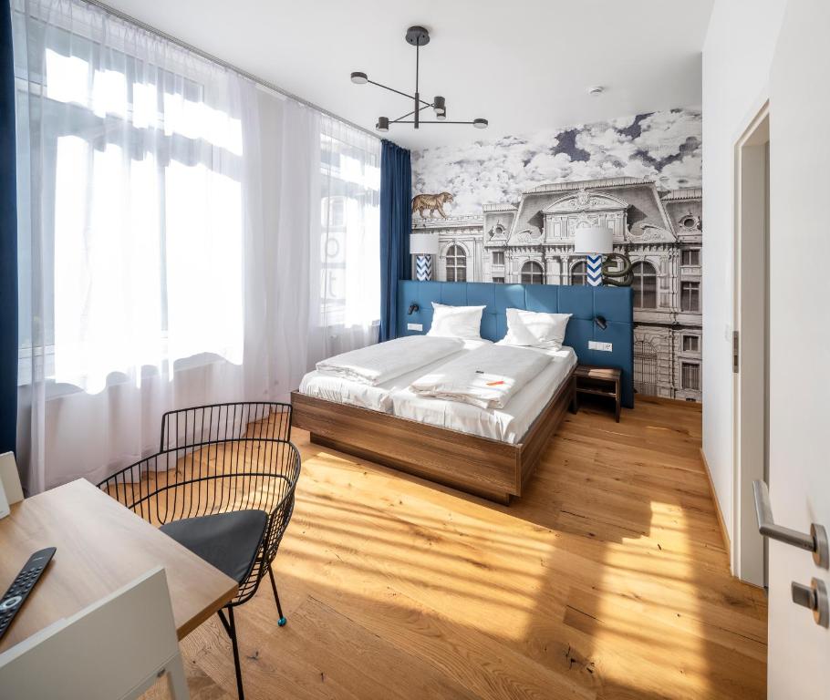 Postel nebo postele na pokoji v ubytování acor Boutique Hotel