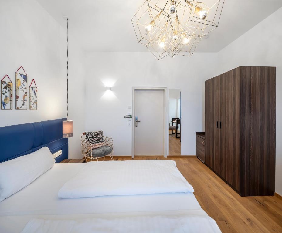 Postel nebo postele na pokoji v ubytování acor Boutique Hotel