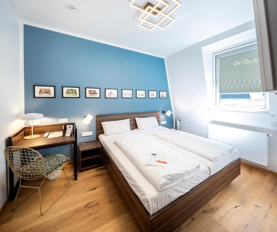 Postel nebo postele na pokoji v ubytování acor Boutique Hotel