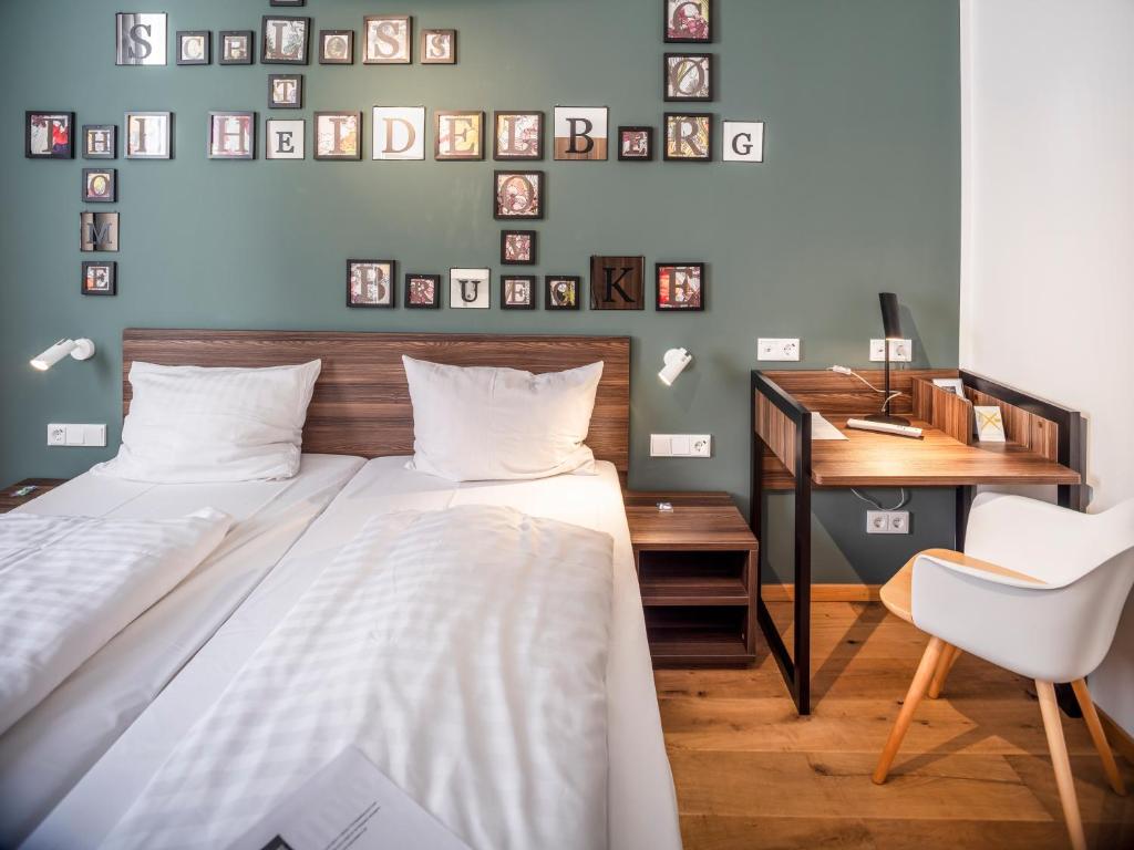 Postel nebo postele na pokoji v ubytování acor Boutique Hotel