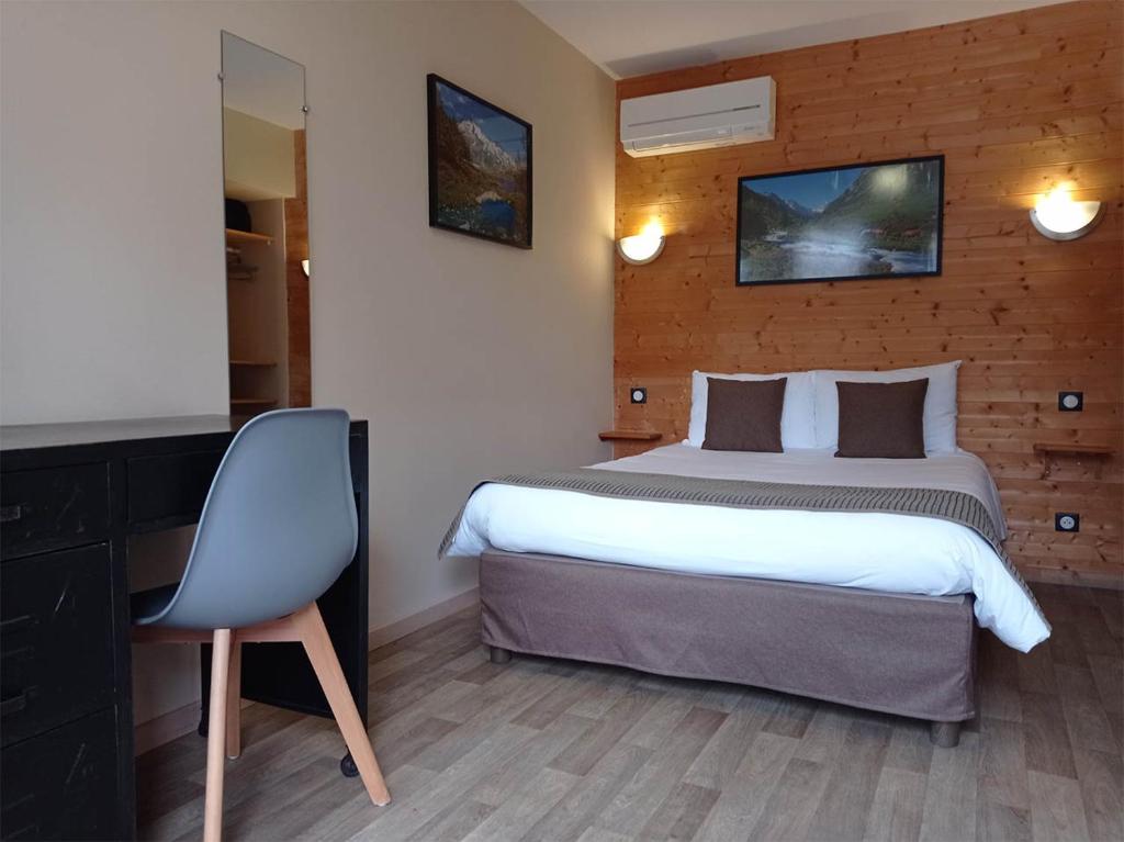 Postel nebo postele na pokoji v ubytování Hôtel de la Gare