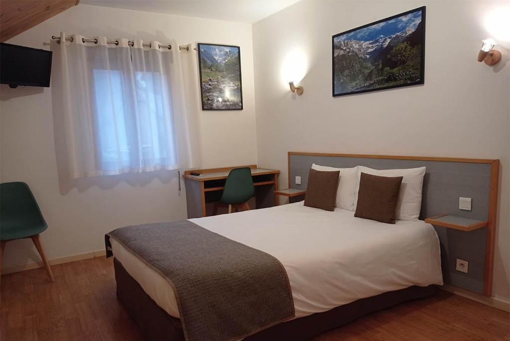 Postel nebo postele na pokoji v ubytování Hôtel de la Gare