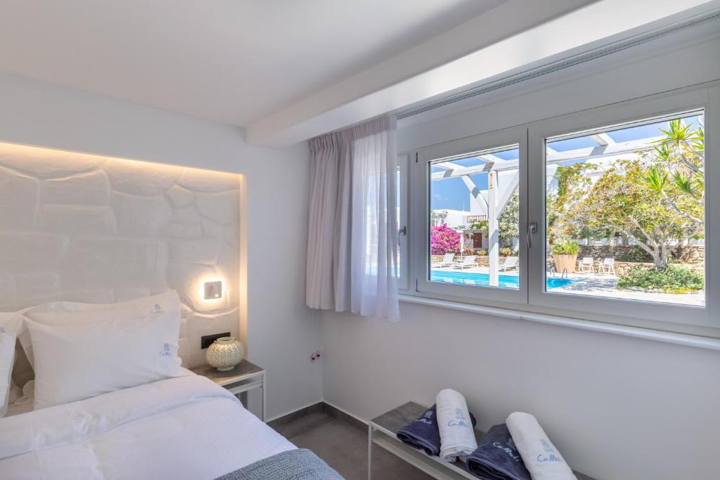 Posteľ alebo postele v izbe v ubytovaní Callisti Mykonos Town with pool view and Calypso upper floor with sea view
