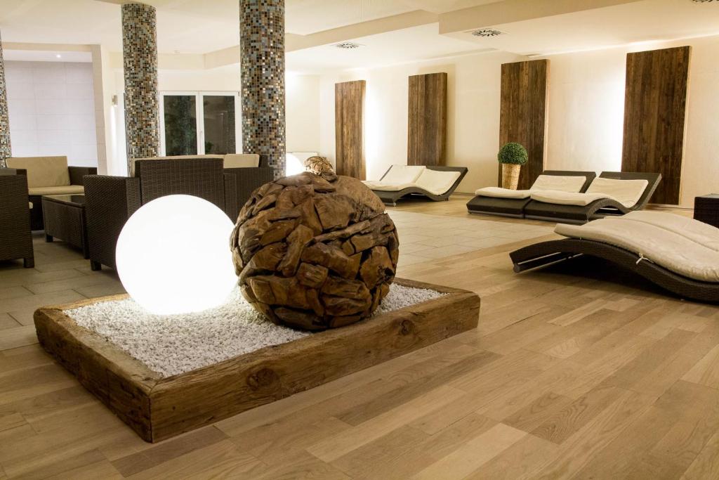 a room with a large sculpture in the middle of it at Appartement Letizia by MoniCare in Seefeld in Tirol