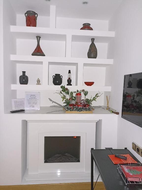 TV a/nebo společenská místnost v ubytování Apartamento Candela